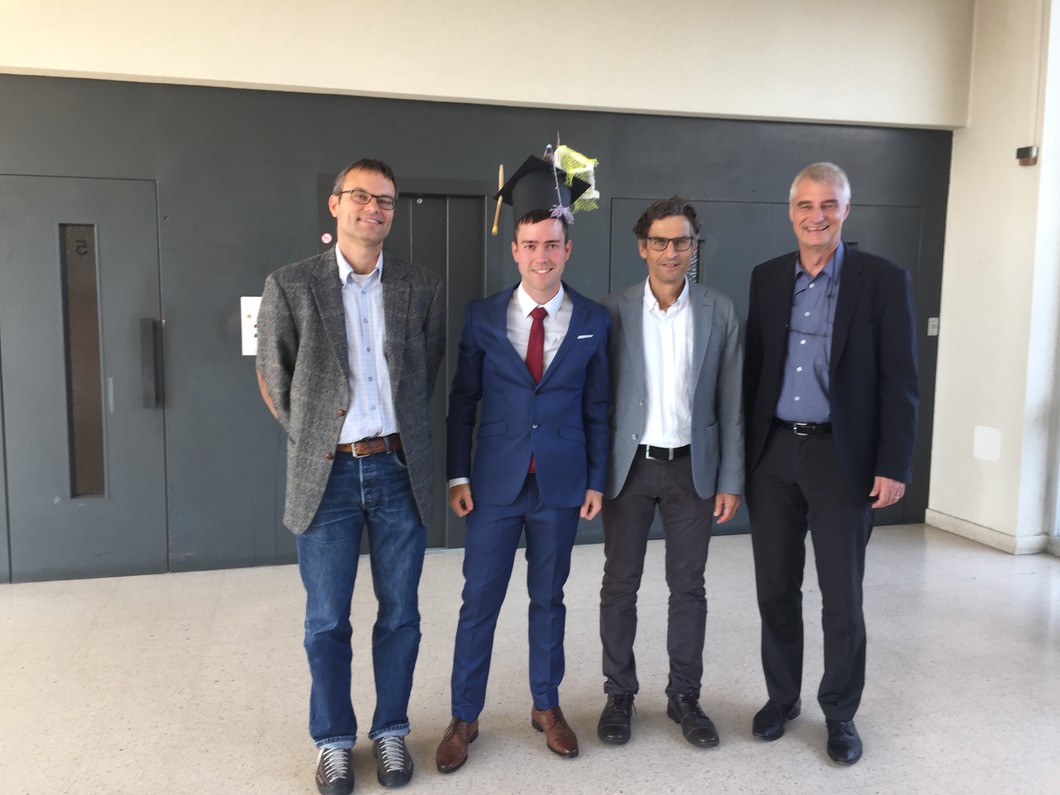 Pablo Corral and the thesis committee after the defense: Matthias Arenz (Uni. Bern), Pablo Corral, Markus Ammann (PSI), and Andreas Türler (Uni. Bern)