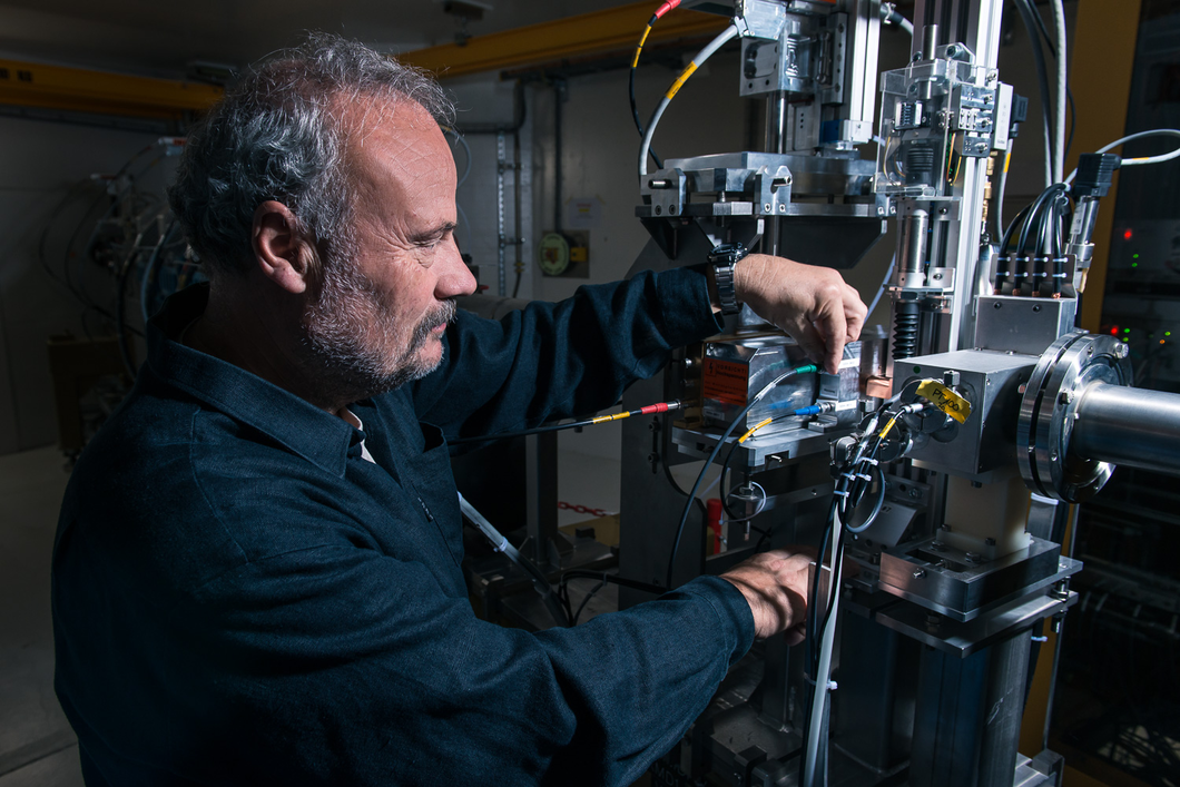 Physicist Martin Grossmann checks a security element in the beam path behind the proton irradiation facility Gantry 3. (Photo: Paul Scherrer Institute/Mahir Dzambegovic)
