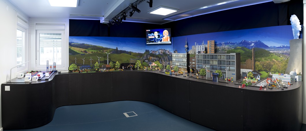 At the centre of the ESI visitor station is a diorama with the interactive model city of Esiville