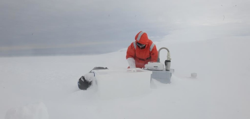 Julia operating an impinger on Young Island, Balleny Islands, East Antarctica