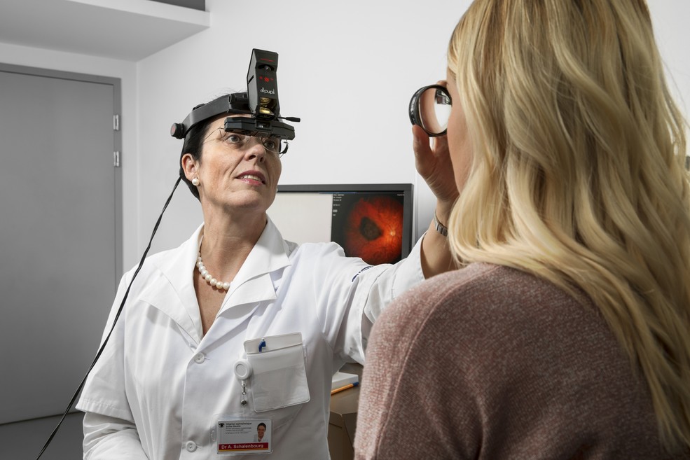 Dr. Ann Schalenbourg examining a patient. (Photo: Scanderbeg Sauer Photography)