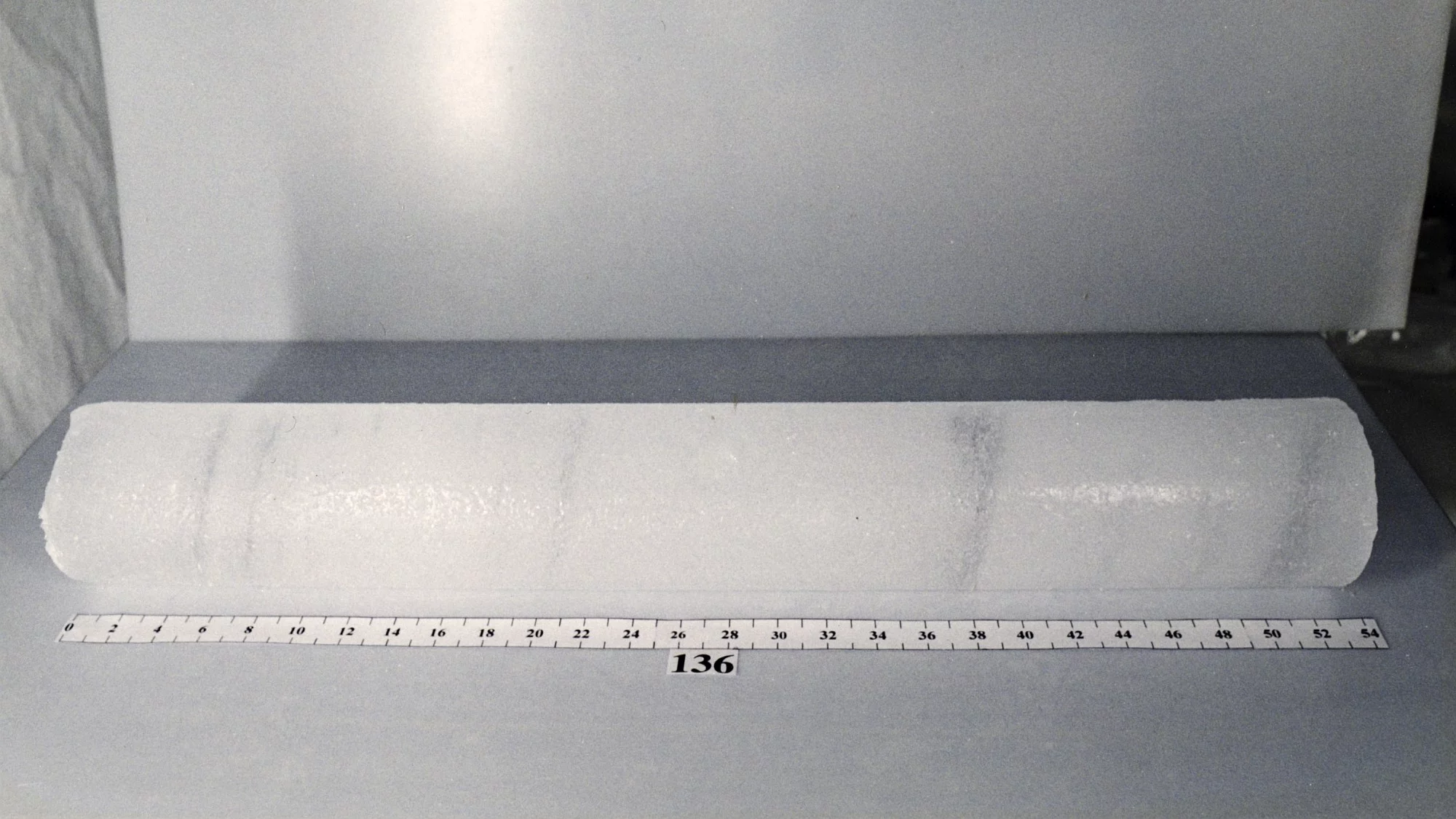 An ice core taken by researchers from a glacier.