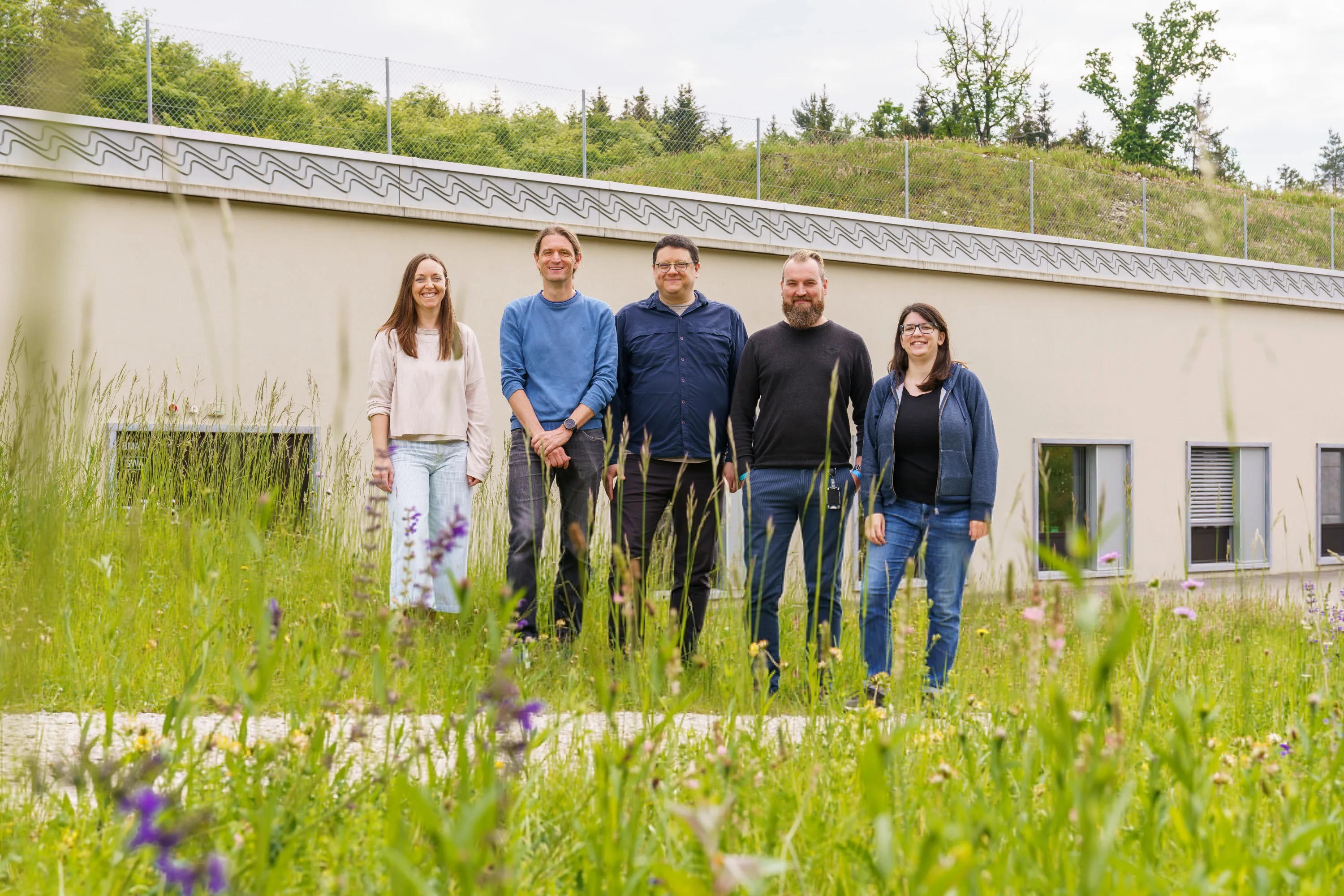 The Alvra team outside SwissFEL. From left to right: Emma Beale, Claudio Cirelli, Philip Johnson, Florian Dworkowski and Camila Bacellar.