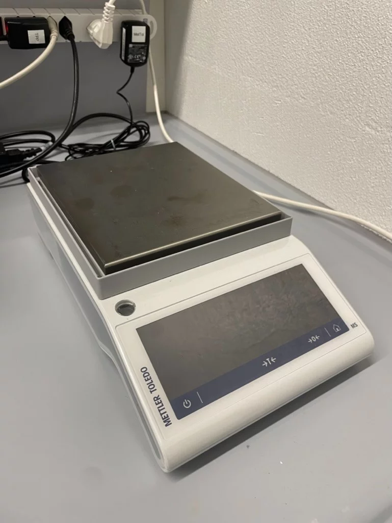 Large weight scales with a digital display on a laboratory bench