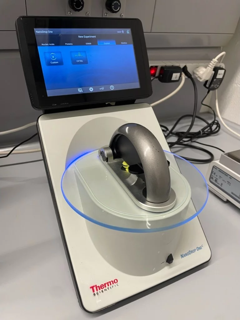 Spectrophotometer with a touch screen on a laboratory bench