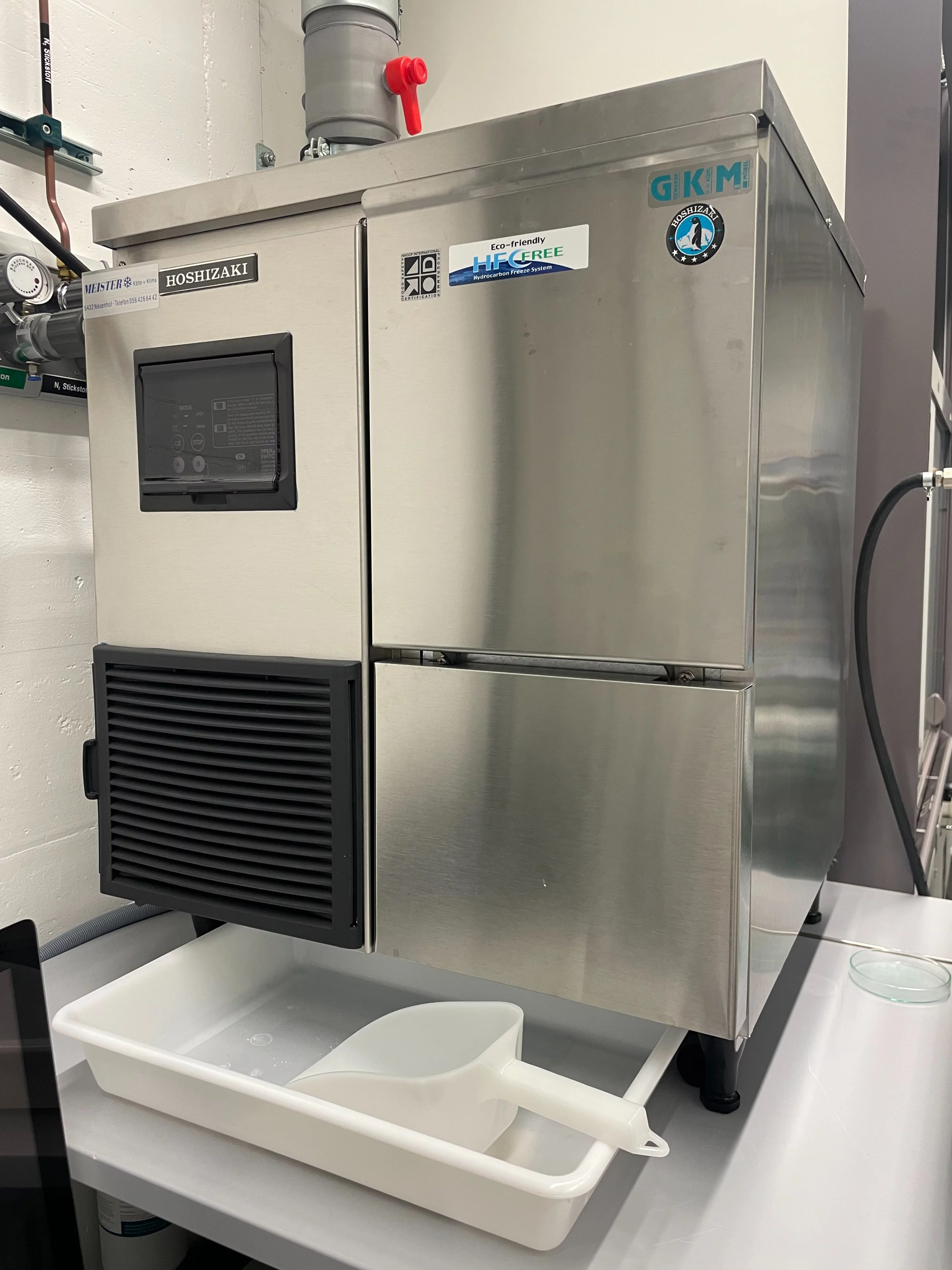 Large metal box with digital screen and fold out door