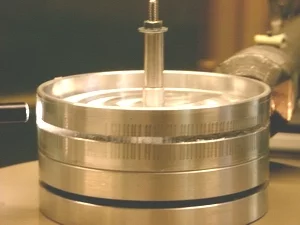 Sample holder with ambient aerosol sample during XRF analysis at HASYLAB, Hamburg, Germany.