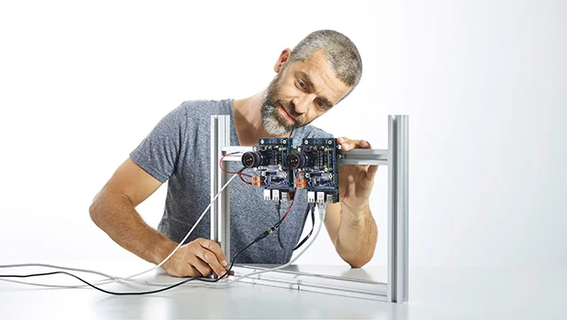 David Haberthür, a postdoctoral student in the X-Ray Imaging Group at PSI, tested more than one hundred components for a robust x-ray machine. They produce digital X-ray images that can also be sent to specialists by mobile telephone if need be. (Photo: Scanderbeg Sauer Photography)