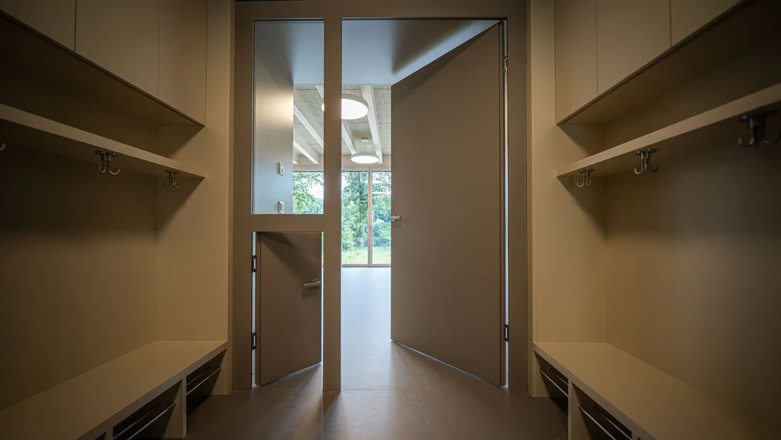 Small doors right next to the big ones help the children to move independently from room to room.