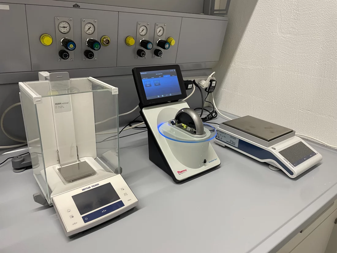 High accuracy weighing scales and a small spectrometer machine