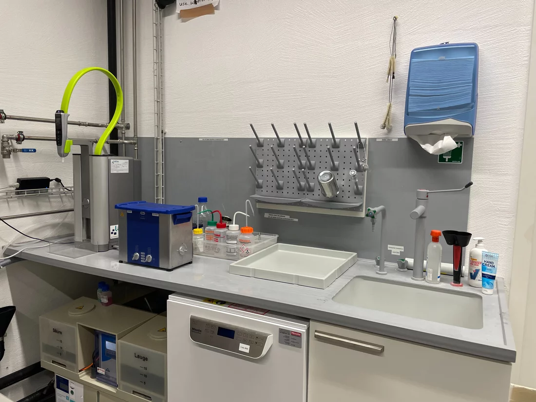 A sink with some scientific equipment
