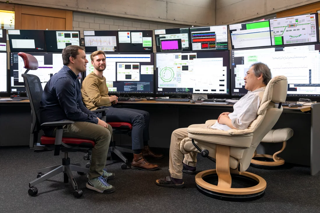 Felix Armborst, Jonas Kallestrup, and Masamitsu Aiba (from left) discuss what to do next. 