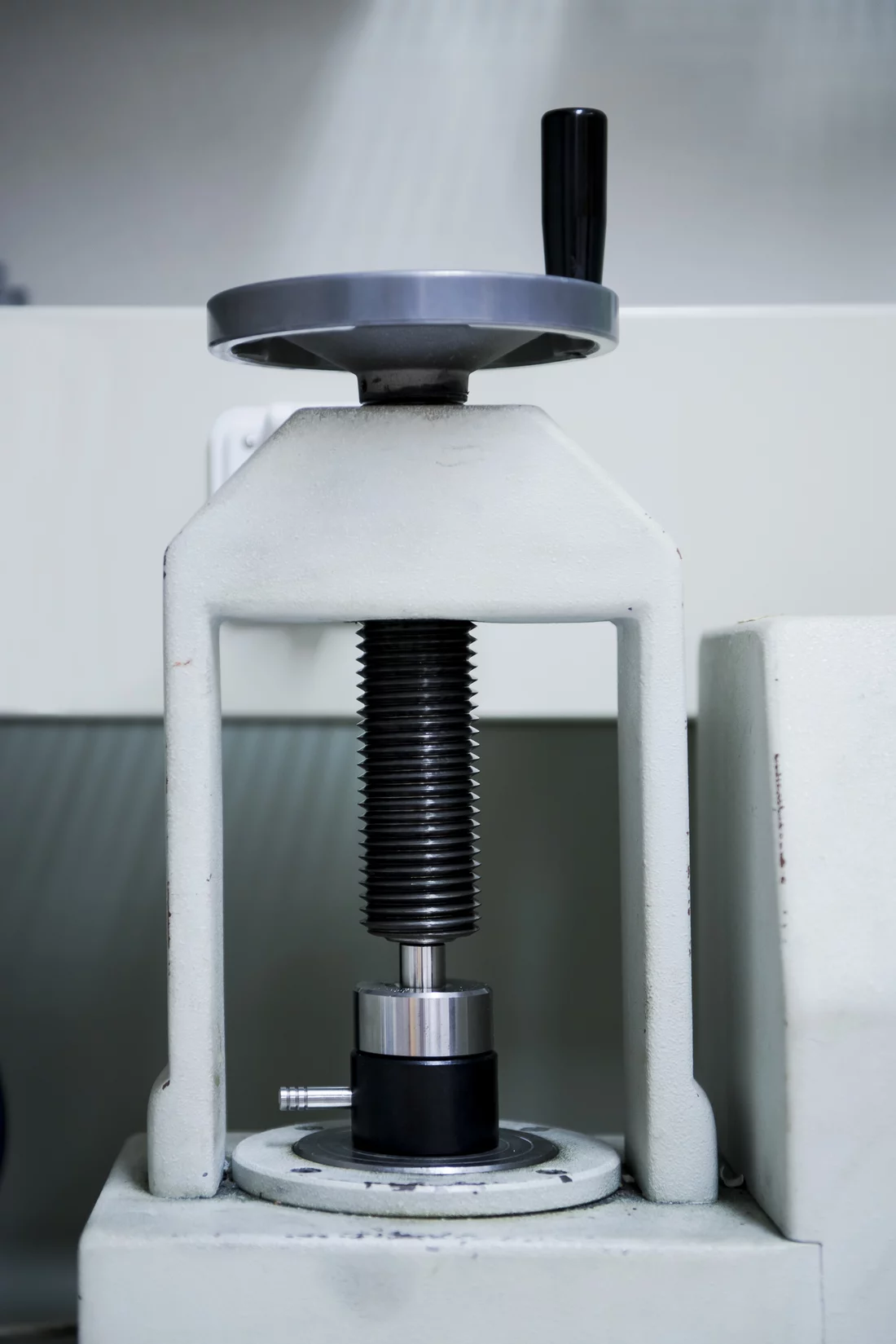 In preparation for irradiation, the precursor material is compacted into a tablet under the force of two tons of pressure and then implanted into the target capsule. (Photo: Paul Scherrer Institute/Mahir Dzambegovic)