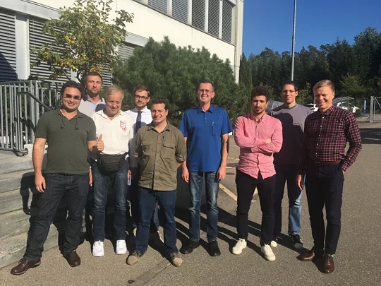 FAST in September 2018 (At the entrance to the NES building). Left to right: Rodrigo de Oliveira, Alexander Ponomarev, Sandro Pelloni, Riccardo Cocci, Boris Hombourger, Konstantin Mikityuk, Simone Mambelli, Janos Bodi, Tuomo Kuovisto.