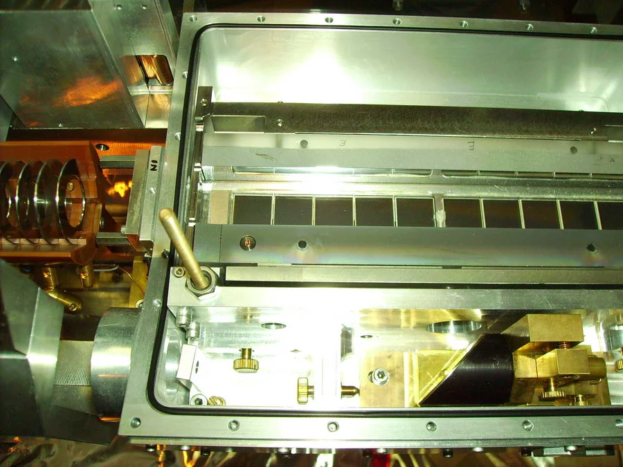 Target chamber opened: the target is filled with 1 mbar hydrogen gas. Muons enter the target from the lower left side after they have crossed the 5 shiny rings of our