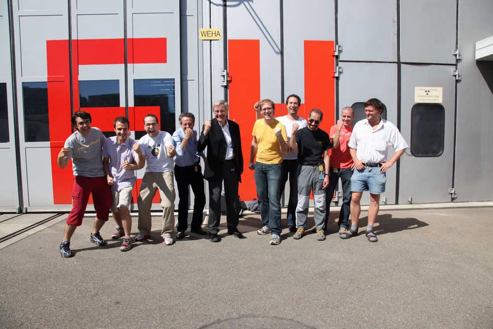 Partial group picture taken in front of the PSI experimental hall.
