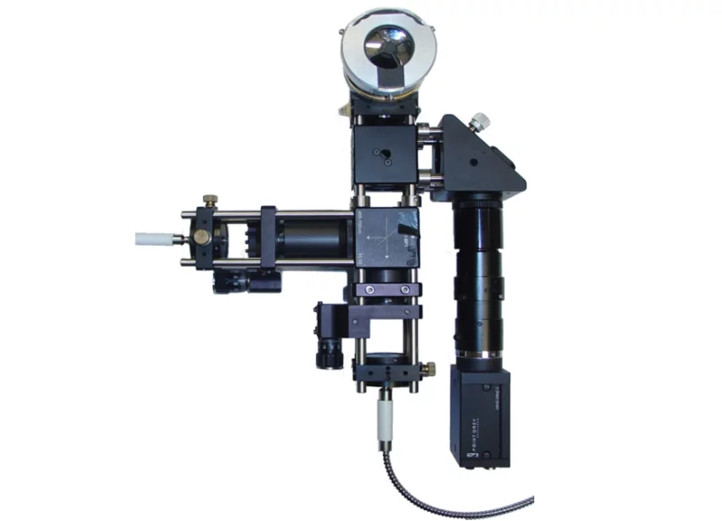 Figure 4: The SLS Microspectrophotometer, Version 2 (MS2). On the left site the exitation arm with the fiber-holder is clearly visible. The signal is collected through the middle arm and coupled into a fiber connected to the spectrograph. The imaging branch with photo-optics and a regular CCD camera is on the right.