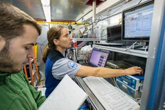 Andrea Baccarini and Julia Schmale in the atmospheric measurement container during ACE