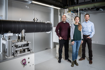 Artur Glavic, Alessandra Luchini and Sven Schütz (from left to right) are pleased to have succeeded in the logistical feat of setting up the ESTIA reflectometer at the ESS.  