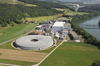 Aerial photograph of the Paul Scherrer Institute (western area) taken in June 2009 with the SLS in the foreground.