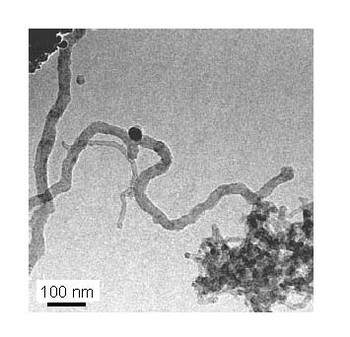 HR-TEM image showing carbon whiskers. The black dots were identified to be Ni clusters.e