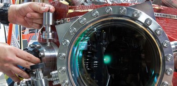 Laser-induced plasma in an ultra high vacuum chamber