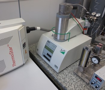 Fig.20. NETZSCH STA 449C analyzer equipped with PFEIFFER VACUUM ThermoStar mass spectrometer. Termogravimetrical curve of hydrogen reduction of DyBaCo2O5+x sample