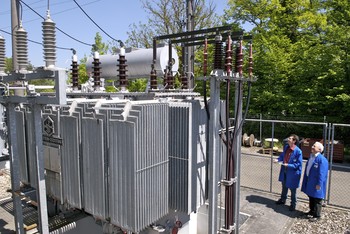 The Paul Scherrer Institute is supplied with electricity from a high-voltage power line at 50 kV. The transformer station shown on the image transforms the electrical voltage to 16 kV before distributing it within the institute. Further transformers situated throughout the institute reduce the voltage to 400 or 230 Volts. (Photo: Paul Scherrer Institute/Markus Fischer)