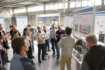 Experts explain the PSI research topics during the tour.