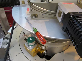 Tools left on the sample rotational table during scans are always 'welcome'